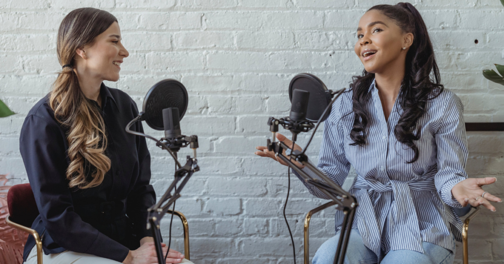 positive black woman talking to radio host