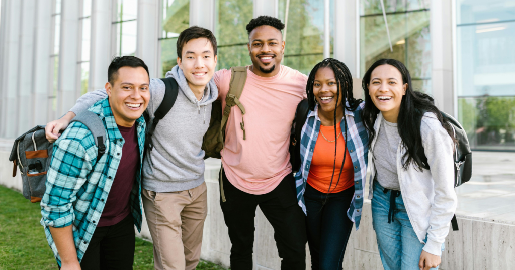 college students standing close together